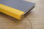 Preview: super notizbuch curry leinen safran leinen schwarz uni